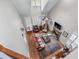 Spacious living room boasts hardwood floors, stone fireplace, and large windows for ample natural light at 1463 Bailey Farm Sw Dr, Marietta, GA 30064