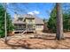 View of rear exterior showing the deck, porch, and expansive back yard at 1463 Bailey Farm Sw Dr, Marietta, GA 30064