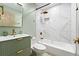 Updated bathroom with a tub, a rain-head shower, and modern fixtures at 2047 Boulderview Se Dr, Atlanta, GA 30316