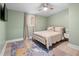 Bright bedroom with a ceiling fan, natural light, and tasteful decor at 2047 Boulderview Se Dr, Atlanta, GA 30316