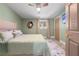 Comfortable bedroom featuring stylish decor, ceiling fan, and neutral color palette at 2047 Boulderview Se Dr, Atlanta, GA 30316