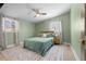 Cozy bedroom with a ceiling fan, natural light, and neutral decor at 2047 Boulderview Se Dr, Atlanta, GA 30316