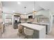 Bright kitchen featuring a central island, stainless steel appliances, and trendy backsplash, perfect for cooking at 2047 Boulderview Se Dr, Atlanta, GA 30316