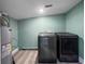 Practical laundry room with washer, dryer, and water heater at 2047 Boulderview Se Dr, Atlanta, GA 30316