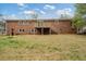 Spacious backyard with a wooden deck and stair access to the yard from the second story at 3355 Lauada Dr, Douglasville, GA 30135