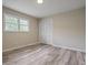 Bedroom with closet, light colored walls and light wood floors at 3355 Lauada Dr, Douglasville, GA 30135