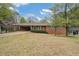 Charming brick ranch home with a covered carport and well-maintained landscaping at 3355 Lauada Dr, Douglasville, GA 30135