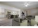Inviting living room with neutral walls, wood floors, and an open dining area at 3355 Lauada Dr, Douglasville, GA 30135