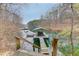 Waterfront property with a private dock and boat lift, offering direct access to serene lake waters at 5995 Lanier Heights Cir, Buford, GA 30518