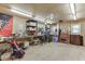 Spacious and organized garage area with ample storage, well-lit and perfect for hobbies and projects at 5995 Lanier Heights Cir, Buford, GA 30518