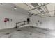 Spacious garage featuring stairs, extra storage, and plenty of parking at 5995 Lanier Heights Cir, Buford, GA 30518