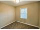 Bedroom featuring carpet and natural light from one window at 2172 Nancy Way, Loganville, GA 30052