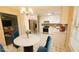 Updated eat-in kitchen featuring stainless steel appliances, a cozy breakfast table, and ample cabinet space at 2172 Nancy Way, Loganville, GA 30052