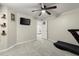 Bedroom featuring a ceiling fan and a view into the living room at 3171 Jessica Dr, Douglasville, GA 30135