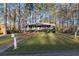 A charming ranch-style home with a covered front porch and a neatly kept lawn at 3171 Jessica Dr, Douglasville, GA 30135