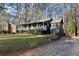 Well-maintained ranch-style home with a welcoming front porch and manicured lawn at 3171 Jessica Dr, Douglasville, GA 30135