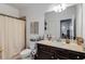 Well lit bathroom with dark vanity at 3475 Summerlin Pkwy, Lithia Springs, GA 30122