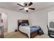Spare bedroom with a dark ceiling fan and space to work at 3475 Summerlin Pkwy, Lithia Springs, GA 30122