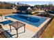 Community pool with covered seating and playground, providing a relaxing outdoor space at 3475 Summerlin Pkwy, Lithia Springs, GA 30122