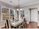 Bright dining room features lots of light and hardwood floors at 3475 Summerlin Pkwy, Lithia Springs, GA 30122