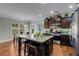 Stylish kitchen with granite countertops, stainless steel appliances, and a central island with bar seating at 3475 Summerlin Pkwy, Lithia Springs, GA 30122