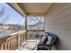 Cozy porch area with comfortable wicker seating and a view of the surrounding neighborhood at 3475 Summerlin Pkwy, Lithia Springs, GA 30122