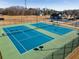 Community tennis courts with well-maintained surfaces, perfect for recreational play at 3475 Summerlin Pkwy, Lithia Springs, GA 30122