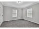 Neutral bedroom with plush carpet, windows, and ample space at 1944 Lakewood Se Ter, Atlanta, GA 30315
