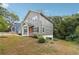 Charming two-story home with well-manicured lawn and welcoming orange front door at 1944 Lakewood Se Ter, Atlanta, GA 30315