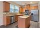 Beautiful kitchen featuring granite countertops and stainless steel appliances at 3879 Brockenhurst Dr, Buford, GA 30519