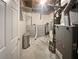Unfinished basement utility room with concrete floor and block walls at 5216 Sweet Air Ln, Stone Mountain, GA 30088