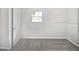 Simple bedroom features updated paint, carpet and a door for entry at 5216 Sweet Air Ln, Stone Mountain, GA 30088