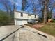 Charming home with a well-maintained front yard and driveway at 5216 Sweet Air Ln, Stone Mountain, GA 30088