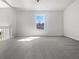 Spacious bonus room with lots of natural light, perfect for a home office at 5216 Sweet Air Ln, Stone Mountain, GA 30088