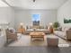 Bright living room with a large window and neutral decor at 5216 Sweet Air Ln, Stone Mountain, GA 30088