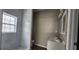 Bathroom featuring double sinks, a walk-in shower, and modern finishes at 884 Thurmond Nw St, Atlanta, GA 30314