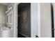 Bathroom featuring double sinks and a doorway to a walk in closet at 884 Thurmond Nw St, Atlanta, GA 30314
