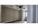 Neutral bedroom features ceiling fan, natural light, and modern flooring at 884 Thurmond Nw St, Atlanta, GA 30314