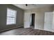 Spacious bedroom featuring wood-look floors and plenty of natural light from the window at 884 Thurmond Nw St, Atlanta, GA 30314