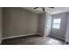 Neutral bedroom features ceiling fan, natural light, and modern flooring at 884 Thurmond Nw St, Atlanta, GA 30314