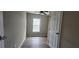 Bedroom featuring wood-look floors and plenty of natural light from the window at 884 Thurmond Nw St, Atlanta, GA 30314