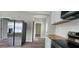 Modern kitchen with stainless steel appliances, white cabinets, and a wood countertop at 884 Thurmond Nw St, Atlanta, GA 30314