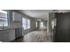 Open floor plan showing the kitchen blending into the living room with modern flooring at 884 Thurmond Nw St, Atlanta, GA 30314