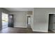 A freshly painted living room shows an open floor plan with wood flooring at 884 Thurmond Nw St, Atlanta, GA 30314