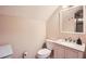 Bathroom featuring granite countertop, modern fixtures, and tile shower at 1438 Janmar Rd, Snellville, GA 30078