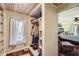 Walk-in closet with built-in shelving and ample storage space, next to main bedroom at 1438 Janmar Rd, Snellville, GA 30078