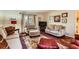 Comfortable living room with plush seating, area rug, and natural light at 1438 Janmar Rd, Snellville, GA 30078