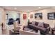 Comfortable living room with a gray couch and chairs provides a cozy space to relax at 1438 Janmar Rd, Snellville, GA 30078