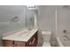 Bathroom featuring a single sink vanity with modern fixtures and a toilet at 2413 Brynlynn Woods, Conyers, GA 30013
