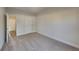 Neutral bedroom features carpet, a door and trim, and large windows for ample natural light at 2413 Brynlynn Woods, Conyers, GA 30013